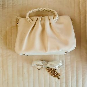White bag with removable long strap included 9x3x6 inch (LWH)